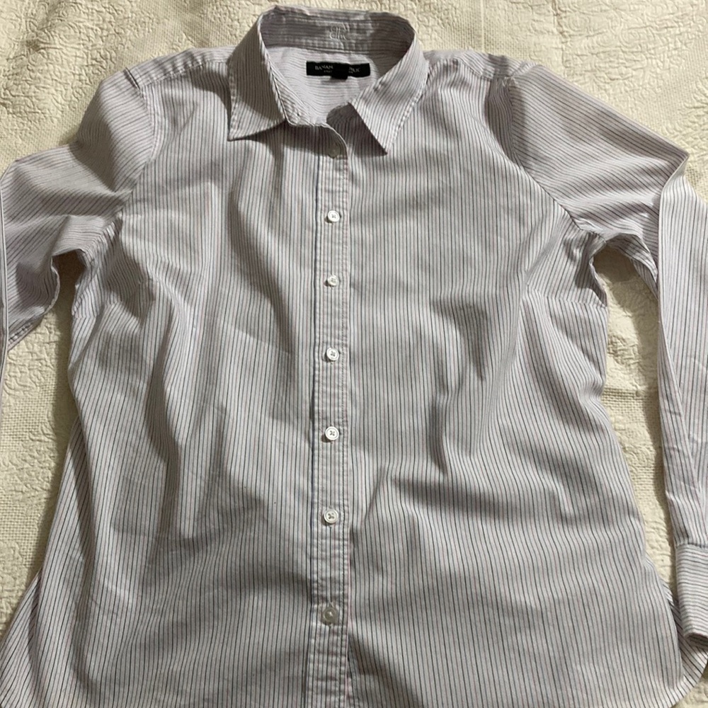 Banana Republic woman’s long sleeved pin striped white shirt size 4.